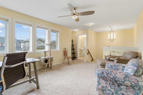 171 Evanswood Circle Nw, Calgary, AB - Indoor Photo Showing Living Room