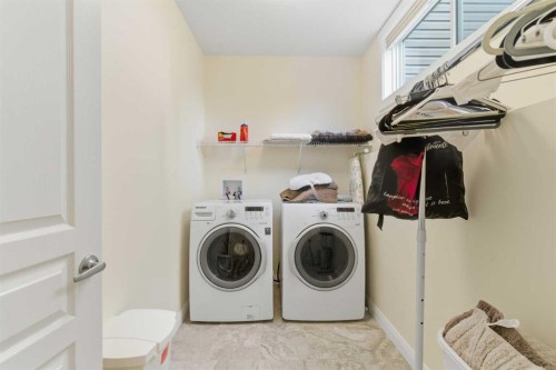 171 Evanswood Circle Nw, Calgary, AB - Indoor Photo Showing Laundry Room