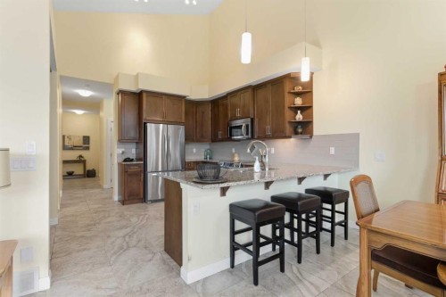 171 Evanswood Circle Nw, Calgary, AB - Indoor Photo Showing Kitchen With Upgraded Kitchen