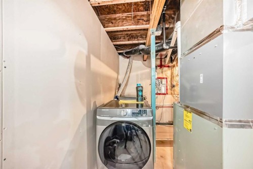 170 Panamount Road Nw, Calgary, AB - Indoor Photo Showing Laundry Room