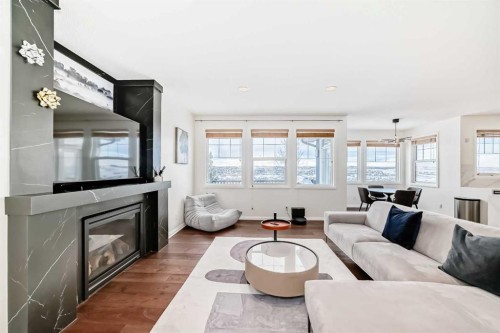 170 Panamount Road Nw, Calgary, AB - Indoor Photo Showing Living Room With Fireplace
