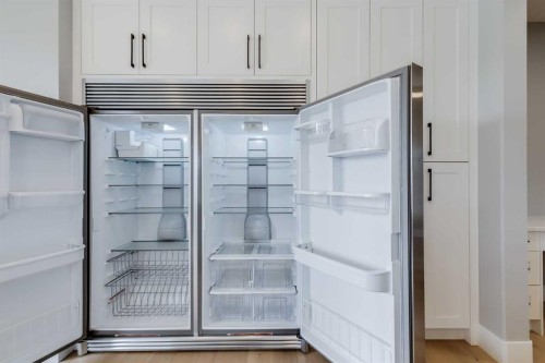 1209 Coopers Drive Sw, Airdrie, AB - Indoor Photo Showing Other Room