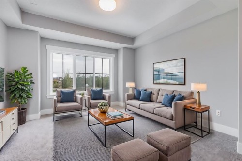 1209 Coopers Drive Sw, Airdrie, AB - Indoor Photo Showing Living Room