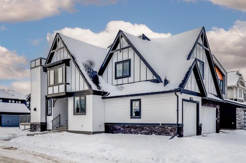 1209 Coopers Drive Sw, Airdrie, AB - Outdoor With Facade