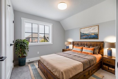 1209 Coopers Drive Sw, Airdrie, AB - Indoor Photo Showing Bedroom