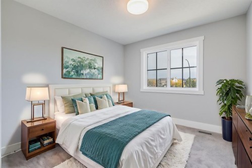 1209 Coopers Drive Sw, Airdrie, AB - Indoor Photo Showing Bedroom