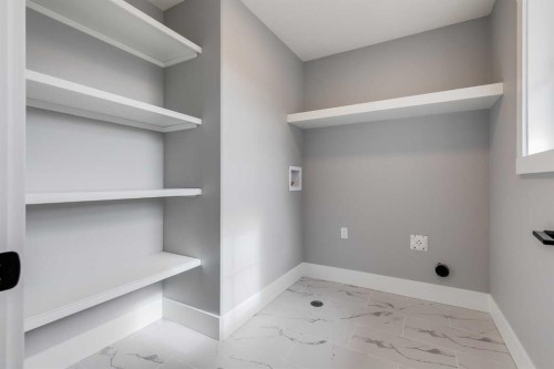 1209 Coopers Drive Sw, Airdrie, AB - Indoor With Storage