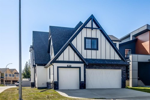 1209 Coopers Drive Sw, Airdrie, AB - Outdoor With Facade