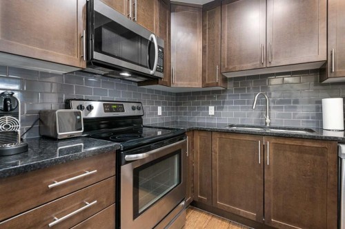 169 Auburn Meadows Walk Se, Calgary, AB - Indoor Photo Showing Kitchen With Stainless Steel Kitchen With Double Sink