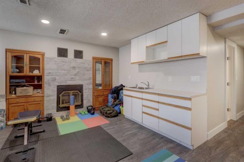 76 Ranchridge Drive Nw, Calgary, AB - Indoor With Fireplace