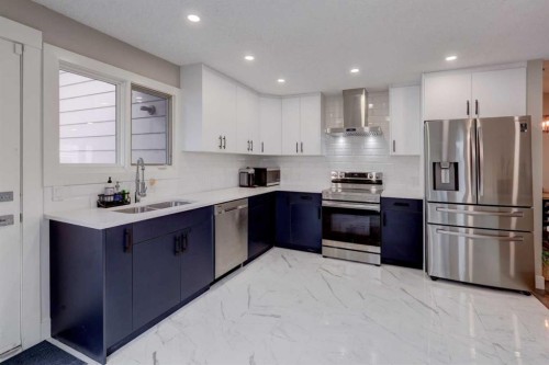 76 Ranchridge Drive Nw, Calgary, AB - Indoor Photo Showing Kitchen With Stainless Steel Kitchen With Double Sink