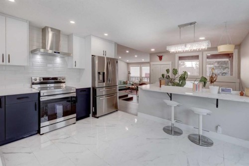 76 Ranchridge Drive Nw, Calgary, AB - Indoor Photo Showing Kitchen With Stainless Steel Kitchen With Upgraded Kitchen