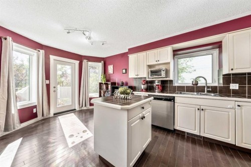 135 Westridge Close, Okotoks, AB - Indoor Photo Showing Kitchen With Stainless Steel Kitchen
