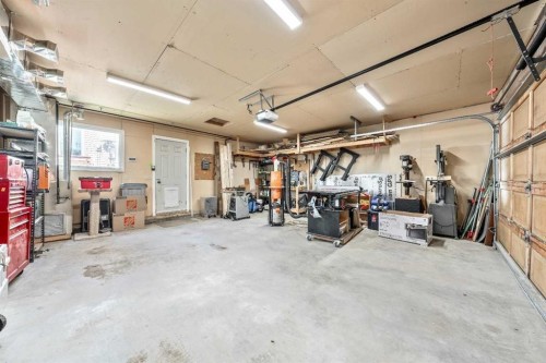 135 Westridge Close, Okotoks, AB - Indoor Photo Showing Garage