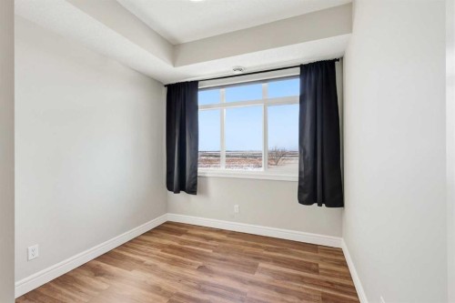 418 Seton Passage Se, Calgary, AB - Indoor Photo Showing Other Room