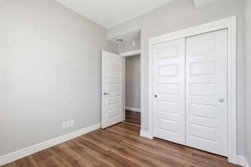 418 Seton Passage Se, Calgary, AB - Indoor Photo Showing Other Room