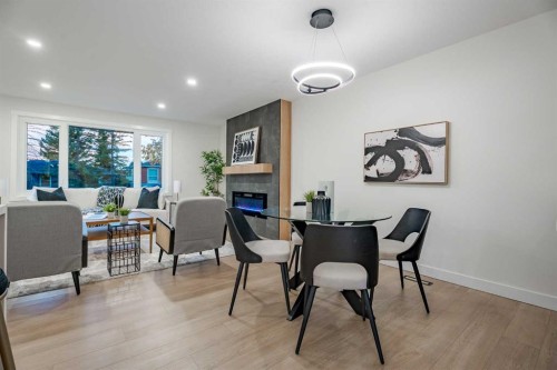 1024 Hunterston Place Nw, Calgary, AB - Indoor With Fireplace