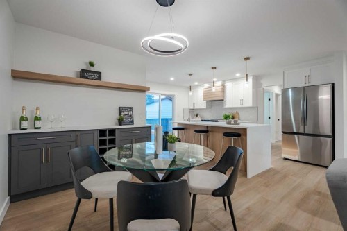 1024 Hunterston Place Nw, Calgary, AB - Indoor Photo Showing Dining Room