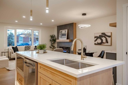 1024 Hunterston Place Nw, Calgary, AB - Indoor Photo Showing Kitchen With Double Sink