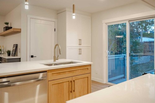 1024 Hunterston Place Nw, Calgary, AB - Indoor Photo Showing Kitchen With Double Sink