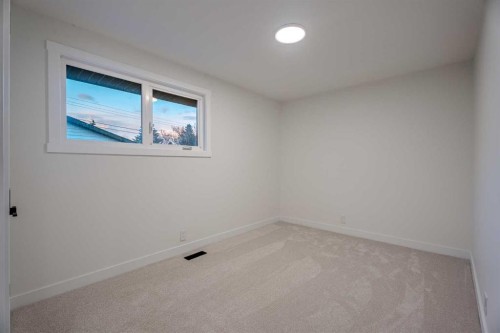 1024 Hunterston Place Nw, Calgary, AB - Indoor Photo Showing Other Room