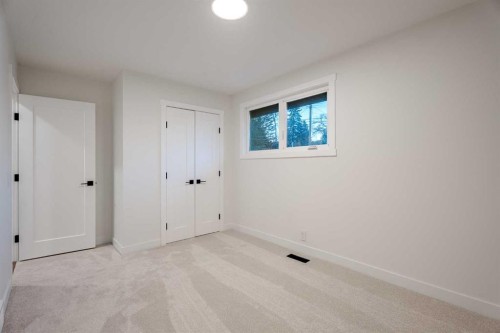 1024 Hunterston Place Nw, Calgary, AB - Indoor Photo Showing Other Room