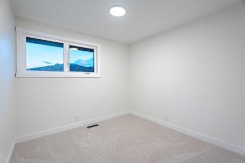 1024 Hunterston Place Nw, Calgary, AB - Indoor Photo Showing Other Room