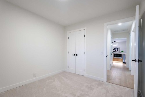 1024 Hunterston Place Nw, Calgary, AB - Indoor Photo Showing Other Room