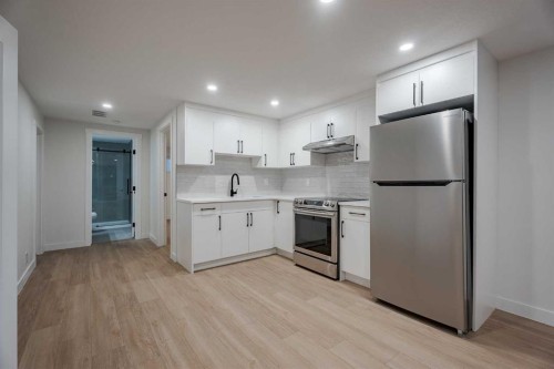 1024 Hunterston Place Nw, Calgary, AB - Indoor Photo Showing Kitchen With Stainless Steel Kitchen