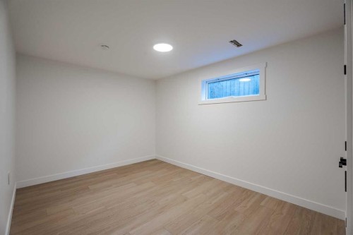 1024 Hunterston Place Nw, Calgary, AB - Indoor Photo Showing Other Room