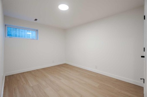 1024 Hunterston Place Nw, Calgary, AB - Indoor Photo Showing Other Room