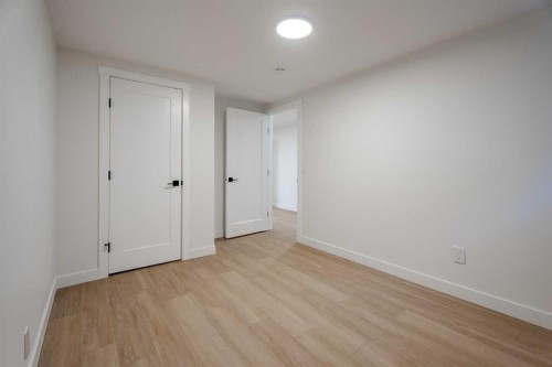 1024 Hunterston Place Nw, Calgary, AB - Indoor Photo Showing Other Room