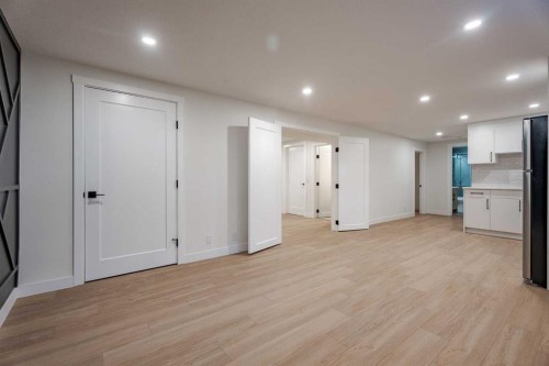 1024 Hunterston Place Nw, Calgary, AB - Indoor Photo Showing Other Room