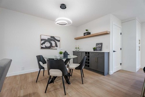 1024 Hunterston Place Nw, Calgary, AB - Indoor Photo Showing Dining Room