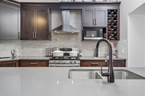 141 Auburn Crest Green Se, Calgary, AB - Indoor Photo Showing Kitchen With Double Sink With Upgraded Kitchen