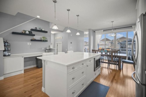 411 River Heights Crescent, Cochrane, AB - Indoor Photo Showing Kitchen With Upgraded Kitchen