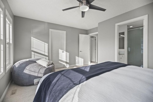 411 River Heights Crescent, Cochrane, AB - Indoor Photo Showing Bedroom