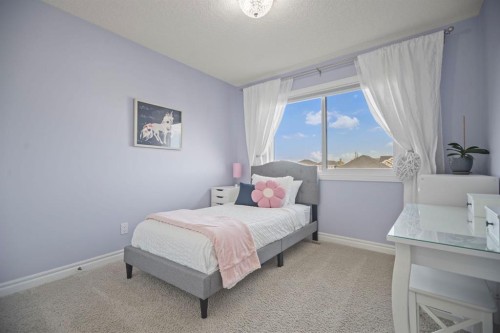 411 River Heights Crescent, Cochrane, AB - Indoor Photo Showing Bedroom