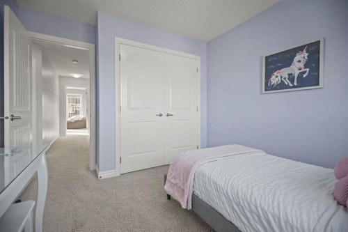 411 River Heights Crescent, Cochrane, AB - Indoor Photo Showing Bedroom
