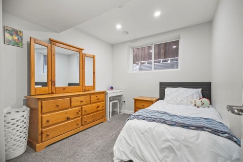 411 River Heights Crescent, Cochrane, AB - Indoor Photo Showing Bedroom
