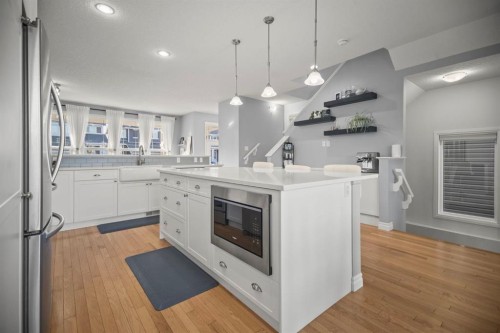 411 River Heights Crescent, Cochrane, AB - Indoor Photo Showing Kitchen