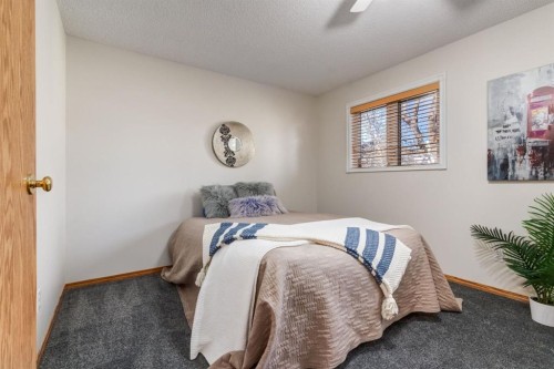 12 Millrise Green Sw, Calgary, AB - Indoor Photo Showing Bedroom