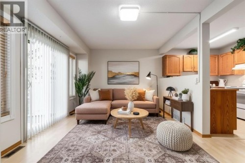 12 Millrise Green Sw, Calgary, AB - Indoor Photo Showing Living Room