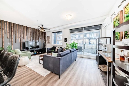 2103-55 Lucas Way Nw, Calgary, AB - Indoor Photo Showing Living Room