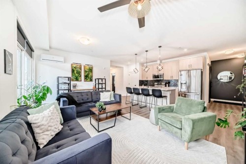 2103-55 Lucas Way Nw, Calgary, AB - Indoor Photo Showing Living Room