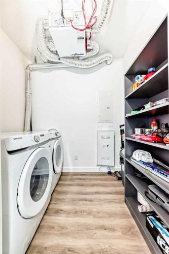 2103-55 Lucas Way Nw, Calgary, AB - Indoor Photo Showing Laundry Room