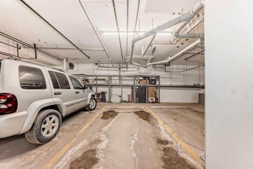 2103-55 Lucas Way Nw, Calgary, AB - Indoor Photo Showing Garage