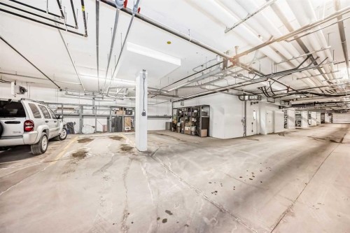2103-55 Lucas Way Nw, Calgary, AB - Indoor Photo Showing Garage