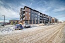 2103-55 Lucas Way Nw, Calgary, AB  - Outdoor With Balcony With Facade 