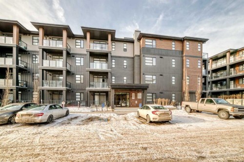 2103-55 Lucas Way Nw, Calgary, AB - Outdoor With Balcony With Facade